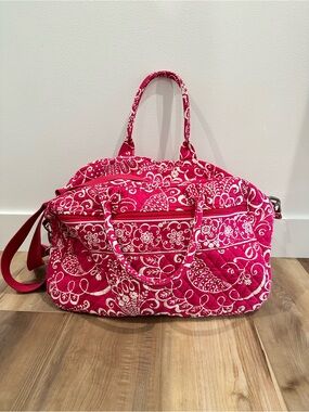 Vera Bradley Weekender bag in the retired Twirly Bird Pink pattern